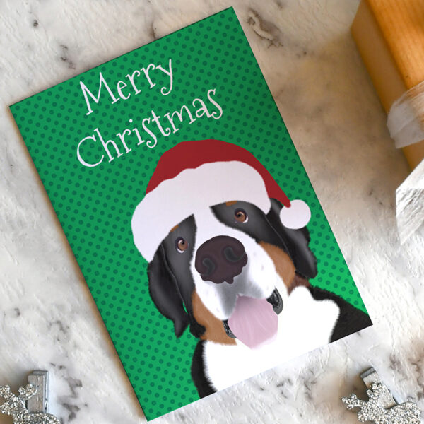 Berner dog Herman in a Santa hat on a card