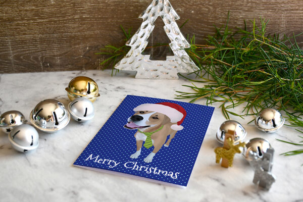 A school card featuring a Staffy mix, Rosco, wearing a Santa hat, surrounded by Christmas decor.