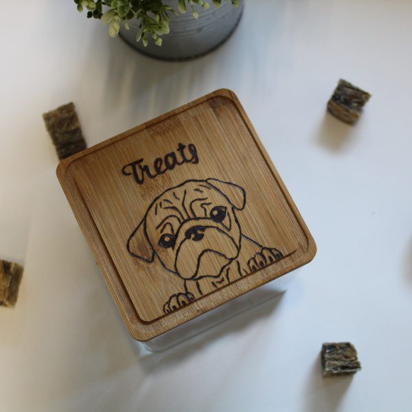 Wooden treat box lid with wood burned image of a pug dog